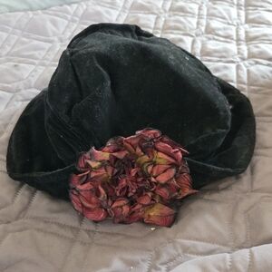 Elegant Black Hat with Floral Accent